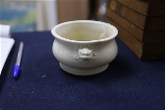 A Chinese Dehua blanc de chine censer, gui, 17th/18th century, W. 14cm, restored, wood cover and stand